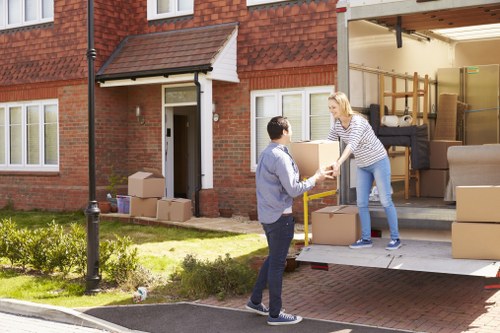 Moving team using safe handling procedures during a Gallowscorner house move