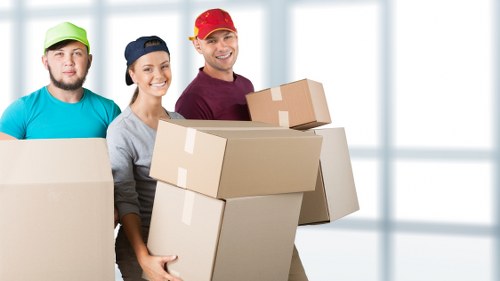 Careful handling of boxes and household items during transport