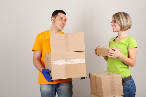 Coordinated office move with labelled boxes and workstations
