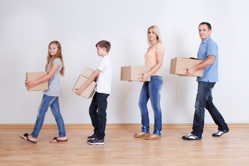 Careful loading of furniture and boxes for a move near Gallows Corner