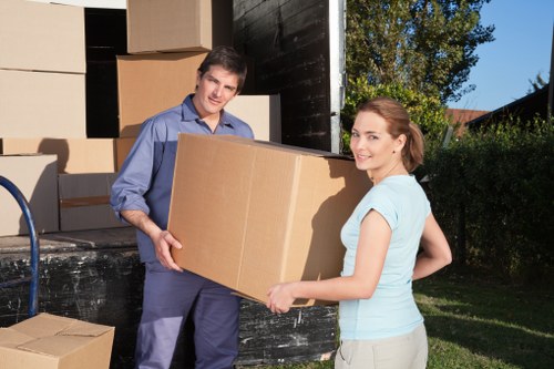 Removal vehicle and staff handling a residential relocation